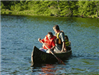 Man and Kids in Canoe